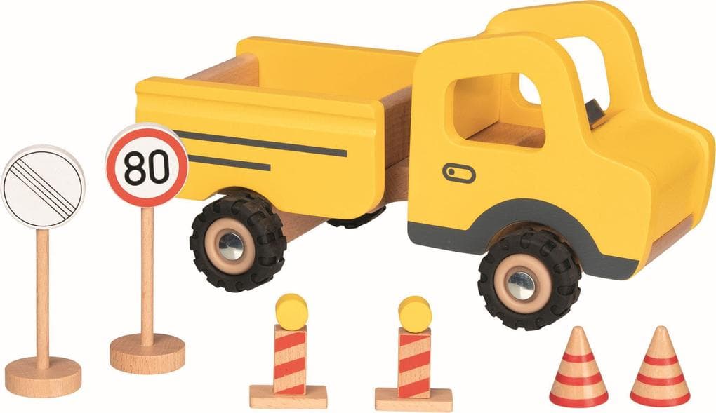 Baustellenfahrzeug mit Verkehrsschildern